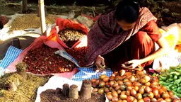 Woman selling vegetables