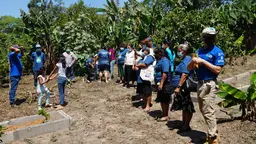 A group of people standing outside