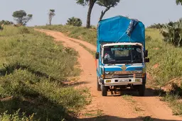Truck on a road in a park.