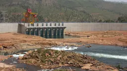 Dam filling up a half empty reservoir