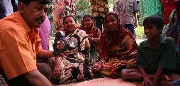 A meeting of community members in Bangladesh. Similar meetings will feed into an international network of government planners sharing strategies on how to mainstream climate change into development planning (Photo: Isabelle Lemaire)