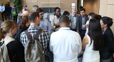 Group of people talking in a circle