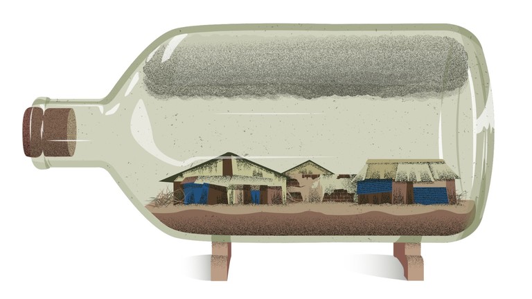 Houses can be seen inside a sealed, glass bottle on its side.