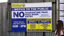 A large sign in a street.