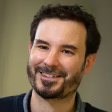 Head and shoulders photo of Lorenzo Cotula.