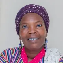 Head and shoulders photo of Alima Sagito-Saeed.