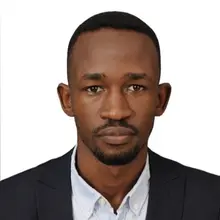 Head and shoulders image of Mustafa Yahia.