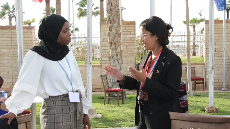 Two women talking