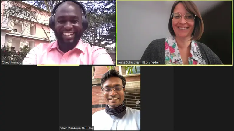 A screenshot of a computer screen on which three people are indvidually looking directly into the camera