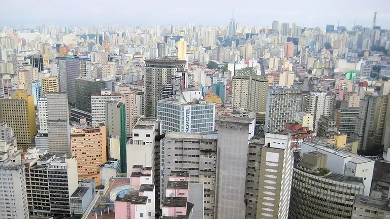 Aerial view of a city with several skyscrappers.