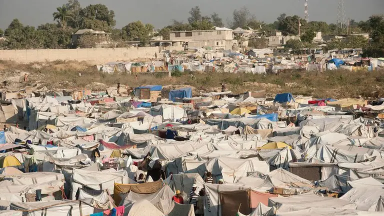 A number of informal tents forming a village.