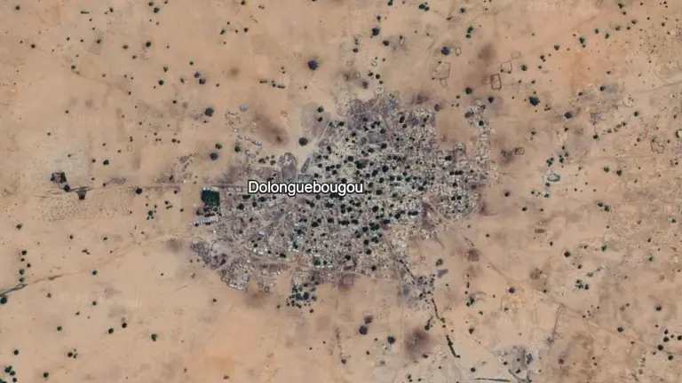 An aerial view of a small cluster of buildings.