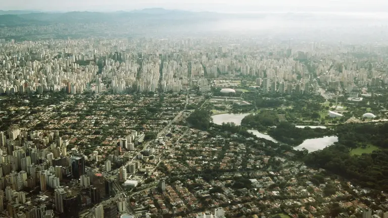 Aerial view on Sao Paulo showing different types of housing like sky scrappers and slums.