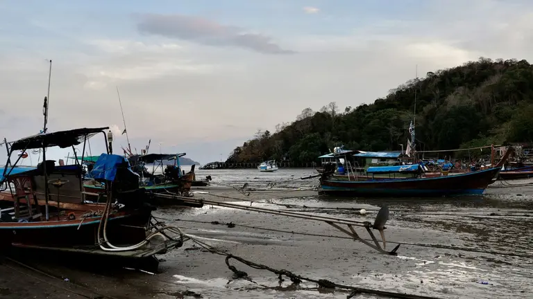 Fishing boats on the shore in Thailand.
