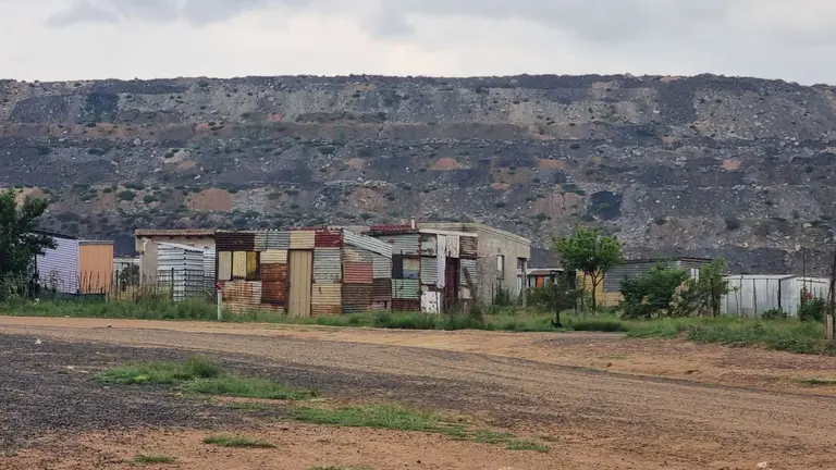 Informal settlement on the edge of a coal mine, Phola, Mpumalanga Province