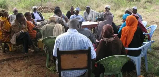 Discussing climate resilience in Kinna, northern Kenya.