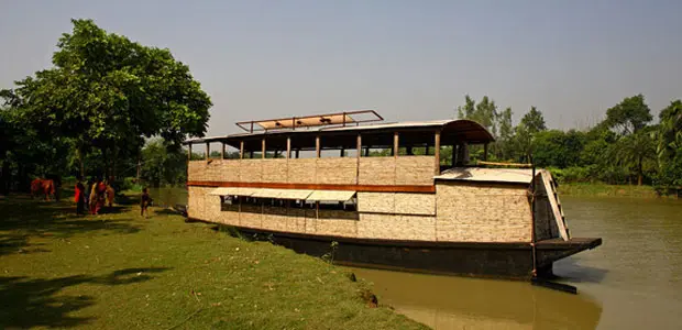 A boat sits on a river in Bangladesh. 
