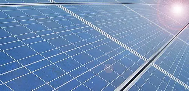 Image of a solar panel, with light glinting off it. 