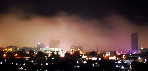 A storm rages over downtown Kigali, the capital of Rwanda, in the early evening (Photo: Jeff_Holmes via Creative Commons http://creativecommons.org/licenses/by/2.0/)