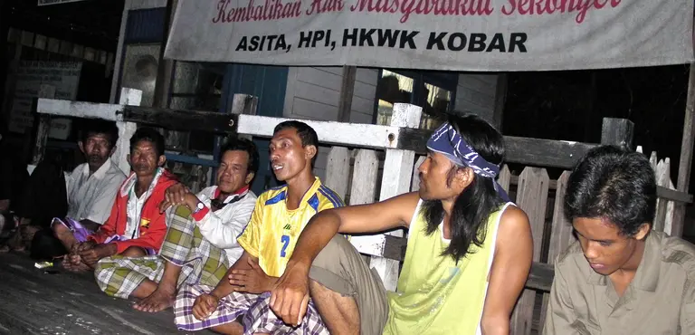 A group of men having a discussion