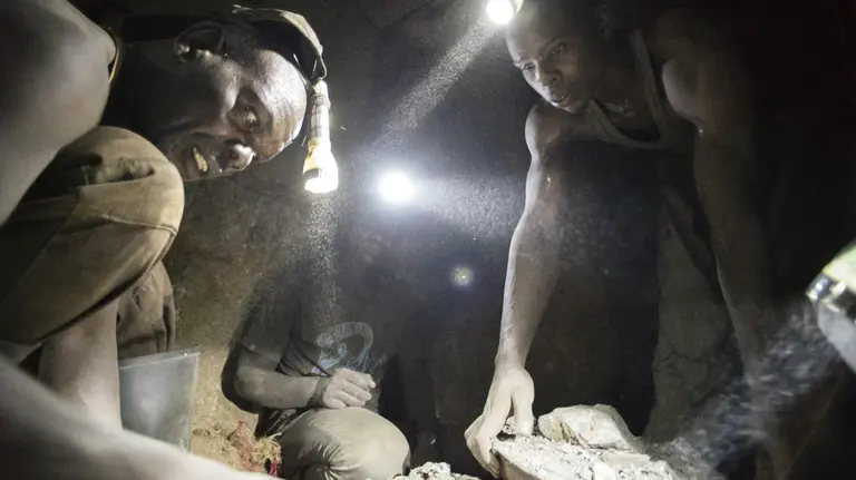 Miners work deep within a tunnel at Nsangano gold mine in the Geita District (Photo: copyright Brian Sokol/Panos Pictures)