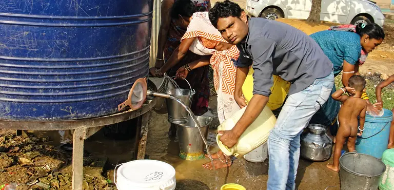 There is no government-provided water connection in the Shivaji Nagar slum area of Raipur. Under UN definitions, a household has "improved provision" for water even if it only has access to a public tap or standpipe. (Photo: indiawaterportal.org, Creative Commons via Flickr)