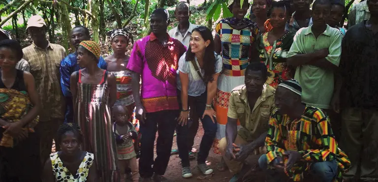 The author with cocoa farmers in Ghana. Farmers on average receive 3 per cent of a chocolate bar price and many are dependent on a single commodity for their livelihoods (Photo: Marisa Camargo)