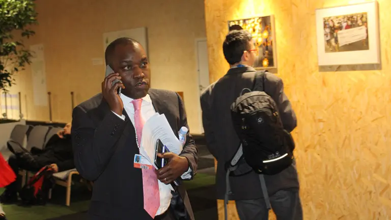 Still damp from the rain outside, Gaspar-Martins is rarely separated from his phone