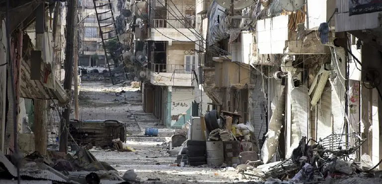 An image of a deserted and war-torn street in Aleppo. Four years of fighting have left much of the Syrian city in ruins. The UN recently warned that up to 300,000 people could be left without food if the last flight route into eastern Aleppo is cut (Photo: Freedom House Salaheddin, Creative Commons via Flickr)