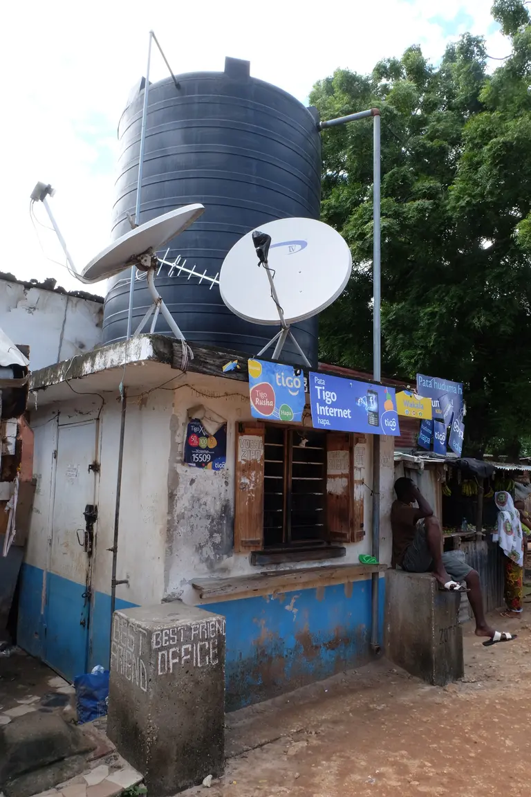 This water kiosk has no water: it sells mobile phone credit (Photo: Anna Walnycki)
