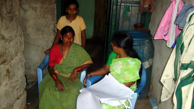 Surveying residents in low-income housing in Vijinapura, India. Receiving accurate data about slums can help local authorities plan solutions (Photo: cstepin, Creative Commons via Flickr)