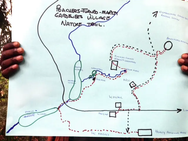 A map shows new walking trails at the edge of the park that have been developed to encourage tourists to explore more of Bwindi and spend money on local products (Photo: Peter Nizette)