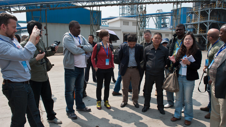 China-Africa Forest Governance Platform participants from Mozambique, Democratic Republic of Congo, Uganda and Cameroon meet employees at a timber processing plant in Tengchong in Southern China (Photo: Simon Lim/IIED)