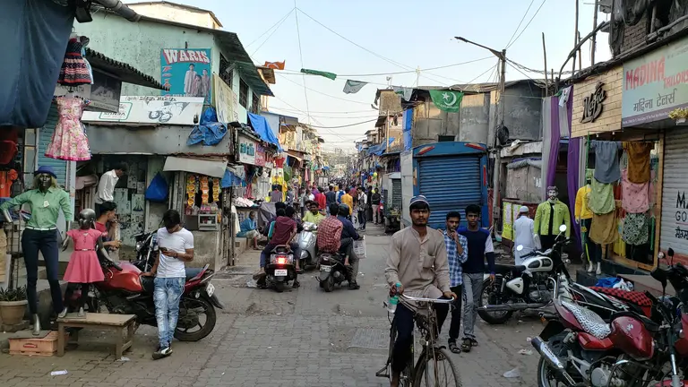 A busy side street in the settlement of Dharavi