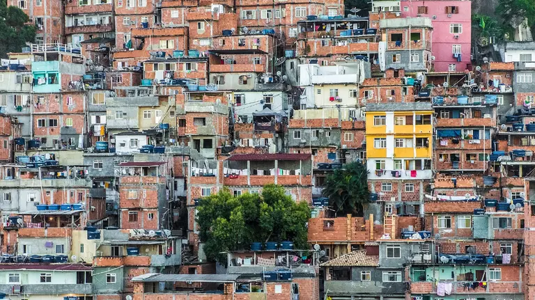 Hundreds of densely packed houses climb into the mountains