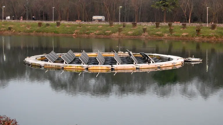 Solar panels on a lake.
