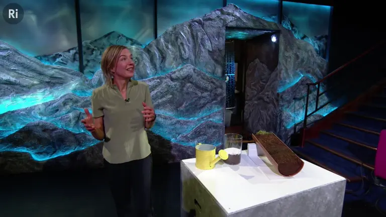 Dr Tara Shine conducts an experiment for her televised lecture