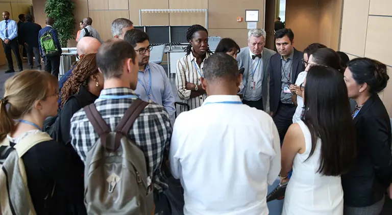 Group of people talking in a circle