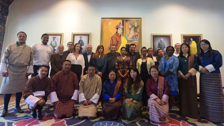 A large group of people pose for a photo