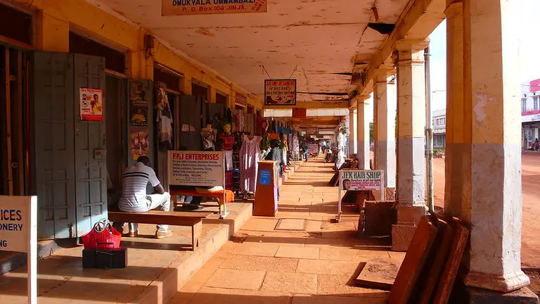 Outdoor shopping arcade with business adverts