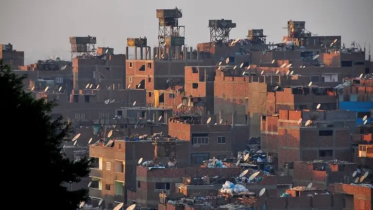 Rubbish bags on top of buildings.