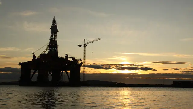 An oil platform in the sea.