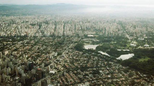 Aerial view on Sao Paulo showing different types of housing like sky scrappers and slums.