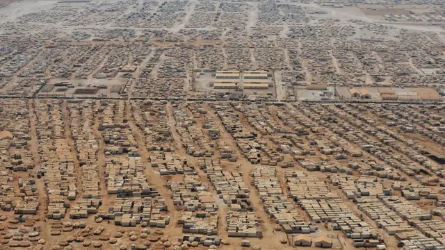 Aerial view of the Zaatari refugee camp showing informal housing set up and spread over a large space.