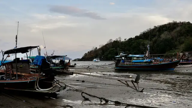 Fishing boats on the shore in Thailand.