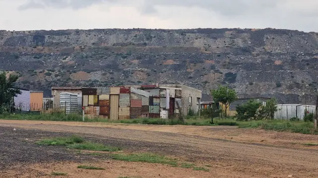 Informal settlement on the edge of a coal mine, Phola, Mpumalanga Province