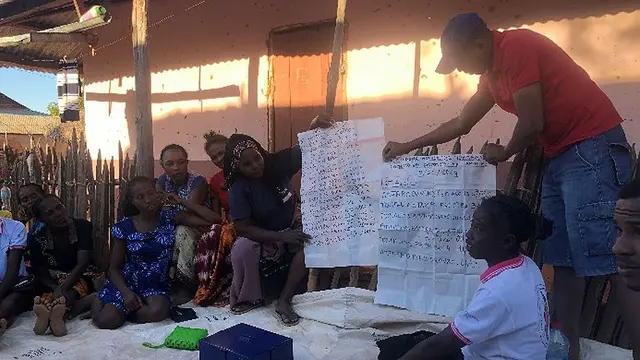 A village savings and loans meeting with National Platform for Women, Sustainable Development and Food Security members.