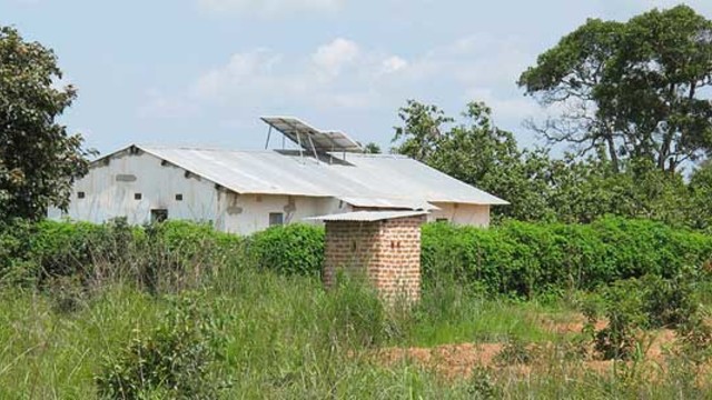 House in Zambia with solar panels on the roof.