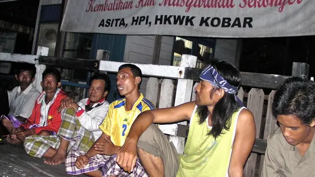 A group of men having a discussion
