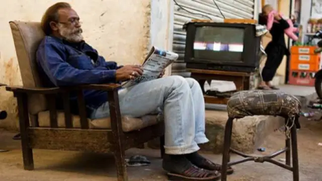 A 'living room on the street' in Paposh Nagar, Karachi (Photo: Fareena Chanda)